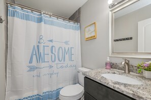 Combined shower/bathtub, hair dryer, towels, soap