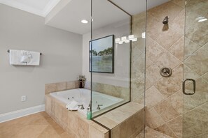 Combined shower/tub, jetted tub, hair dryer, towels