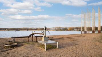 On the beach, sun loungers
