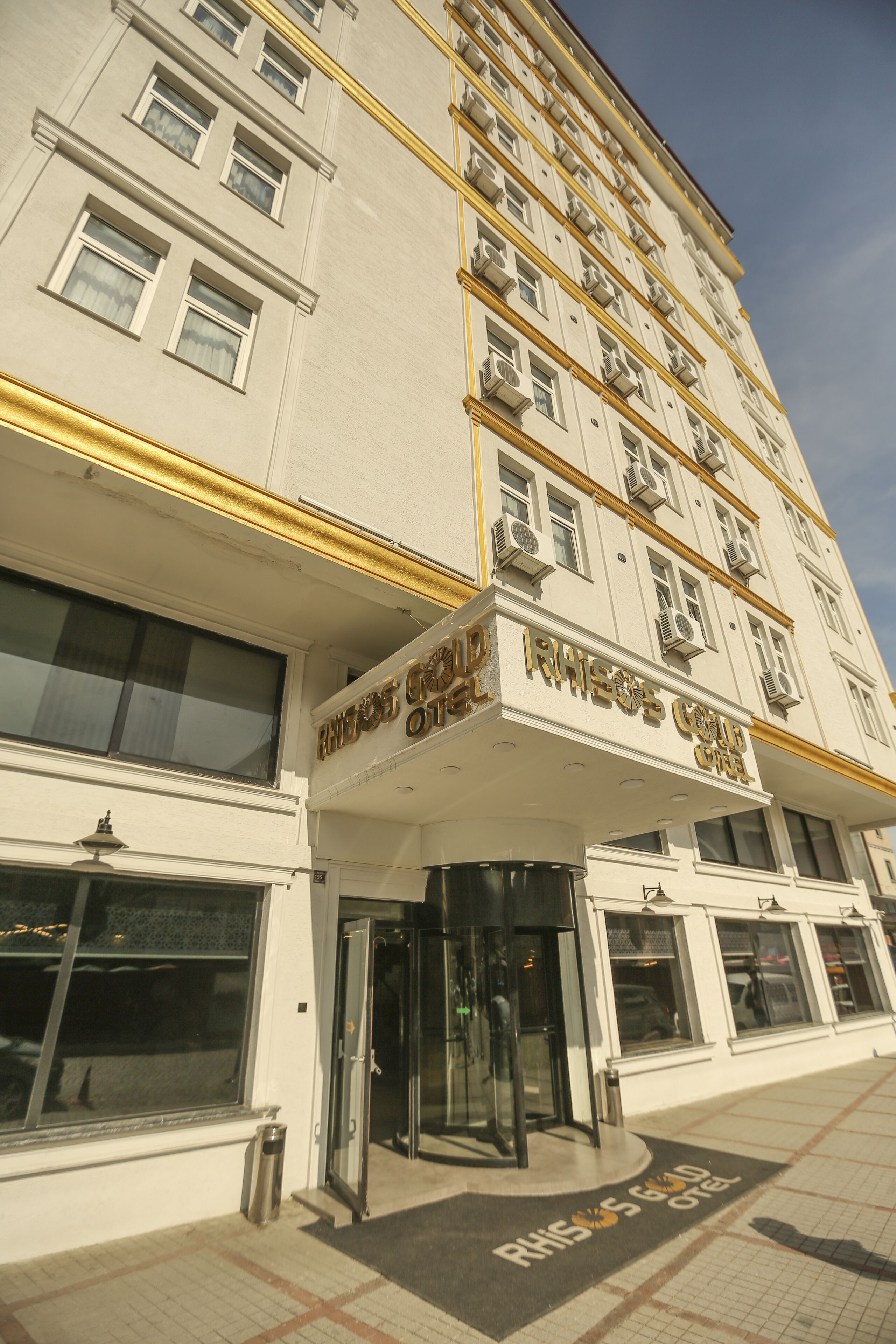 A hotel entrance with a sign reading "Renaissance Hotel."