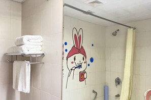A bathroom with a wall mural of a cartoon rabbit, a shower, and a towel rack with folded towels. - Tianhaoyuan Country Club (Beijing)