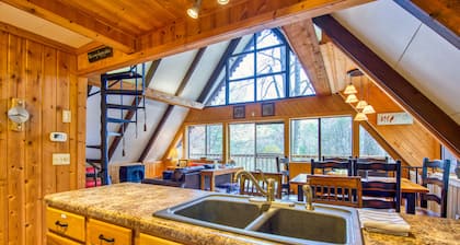 Spacious, dog-friendly A-frame cabin with a furnished deck, gas fireplace, & AC