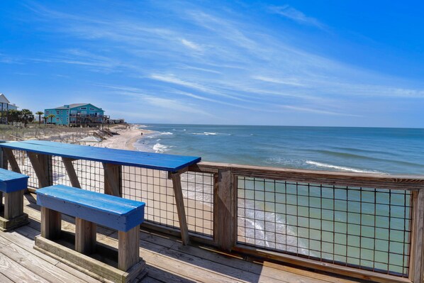 On the beach, sun-loungers