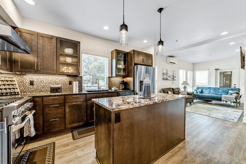 Sunny apt with fireplace, partial water views, washer/dryer, grill & AC