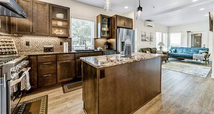 Sunny apt with fireplace, partial water views, washer/dryer, grill & AC