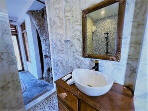 Shower, towels, soap, shampoo