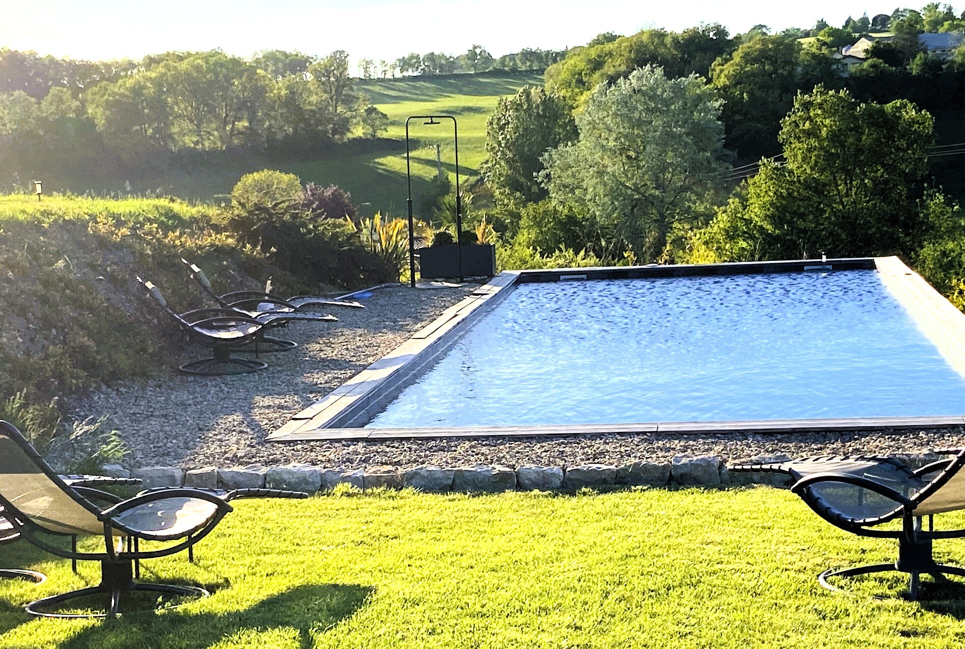 Seasonal outdoor pool, open 8:00 AM to 11:00 PM, sun loungers