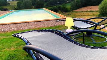 Seasonal outdoor pool, open 8:00 AM to 11:00 PM, sun loungers