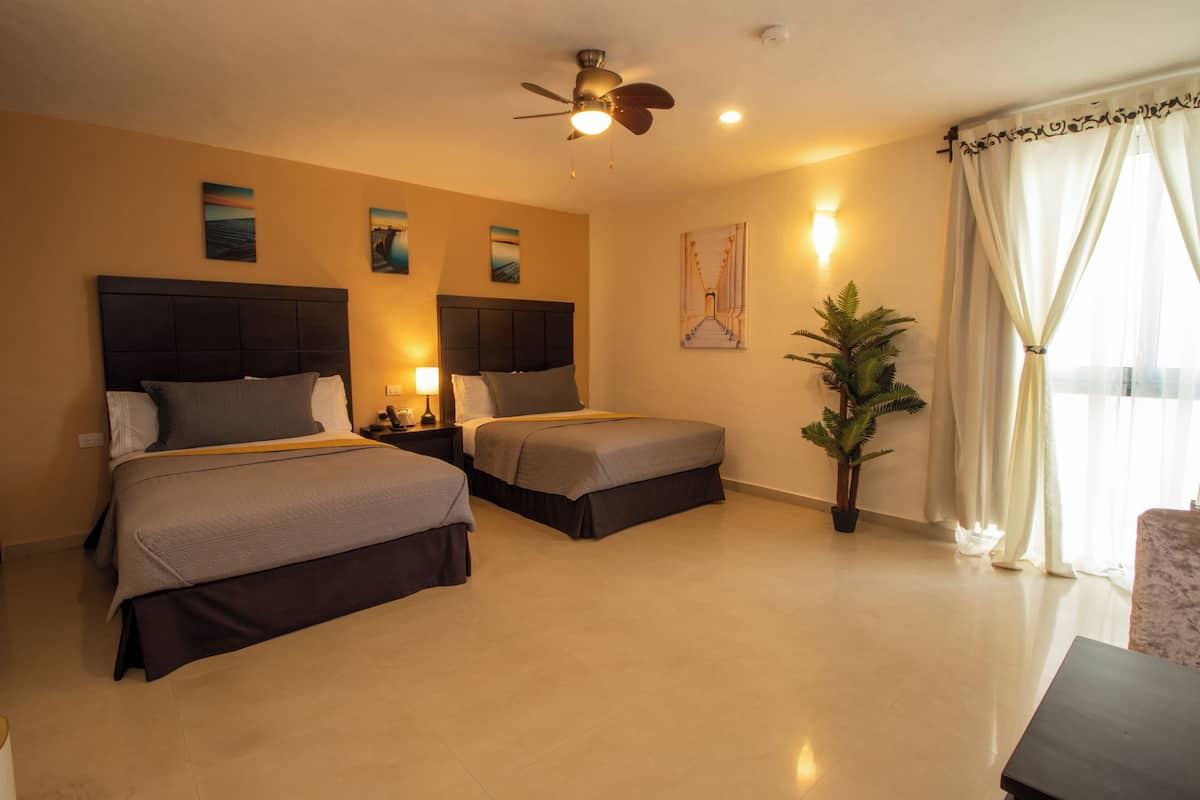 Premium bedding, down duvets, pillow-top beds, in-room safe