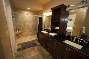 Bathtub, hair dryer, towels, soap