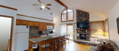 Televisión, chimenea y reproductor de DVD