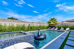 Outdoor pool, a heated pool - Great location,Best value, beautiful home+games (Indio)