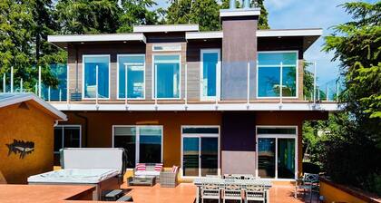 Luxurious Beachfront Villa with private hot tub, huge deck, family/pet-friendly!
