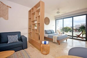 Elite Apartment | Living area | 42-inch Smart TV with cable channels, TV, Netflix - ESTUDIO DELUXE PIEDRAZUL a pasos del mar (Playa del Carmen)