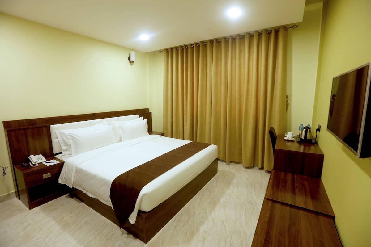 Habitación Deluxe con 1 cama matrimonial o 2 individuales | Wifi gratis y ropa de cama