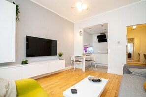 Deluxe Apartment | Living area | 50-inch Smart TV with digital channels, Netflix, streaming services - Le Cwtch - Beautiful 1 Bed Apartment (Cardiff)