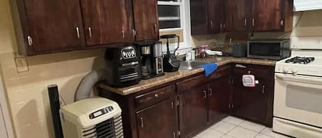 Fridge, oven, coffee/tea maker, toaster