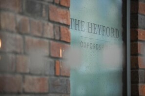 A glass window with the text "THE HEYFORD OXFORDSHIRE" on it. - The Heyford (Bicester)