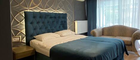 Premium bedding, blackout drapes, soundproofing, iron/ironing board