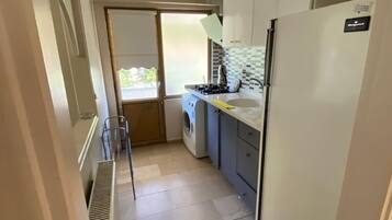 Căn hộ dành cho gia đình, quang cảnh vườn | Bếp riêng | Ghế cao cho trẻ em