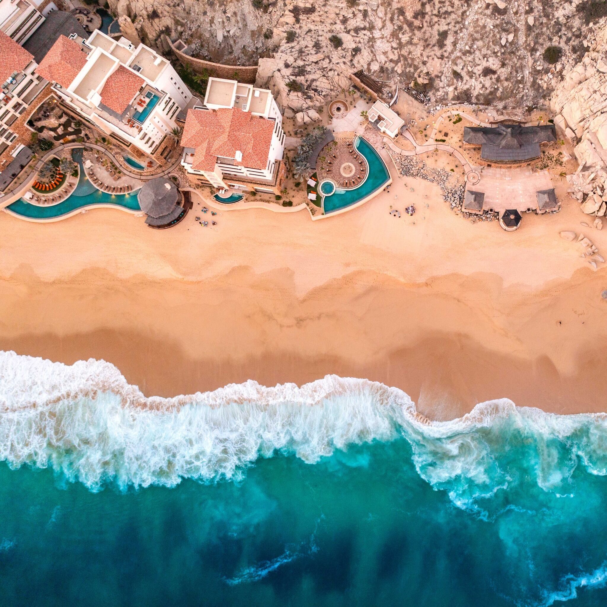 On the beach, sun loungers, beach towels