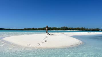 On the beach, sun-loungers, beach towels