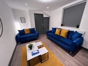 Departamento, 2 camas Queen size | Sala de estar