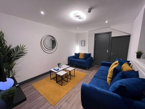 Departamento, 2 camas Queen size | Sala de estar