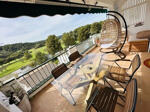 Outdoor dining - FLAT Surrounded by nature, with pool, and beach nearby (ES MERCADAL MENORCA)