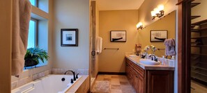 Bathtub, jetted bath, hair dryer, towels