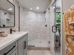 Bathtub, hair dryer, towels, soap