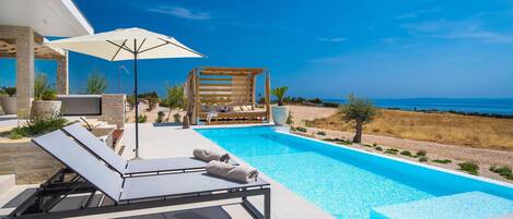Outdoor pool, sun loungers