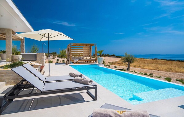 Outdoor pool, sun loungers