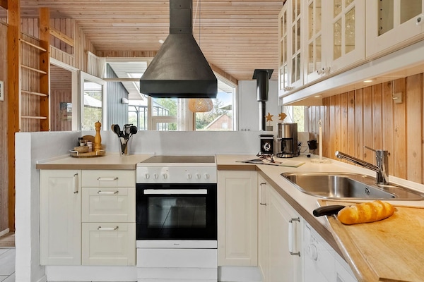 Fridge, stovetop, dishwasher, coffee/tea maker