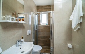 Shower, hair dryer - 1 bedroom nice apartment in Mokosica (Mokosica)