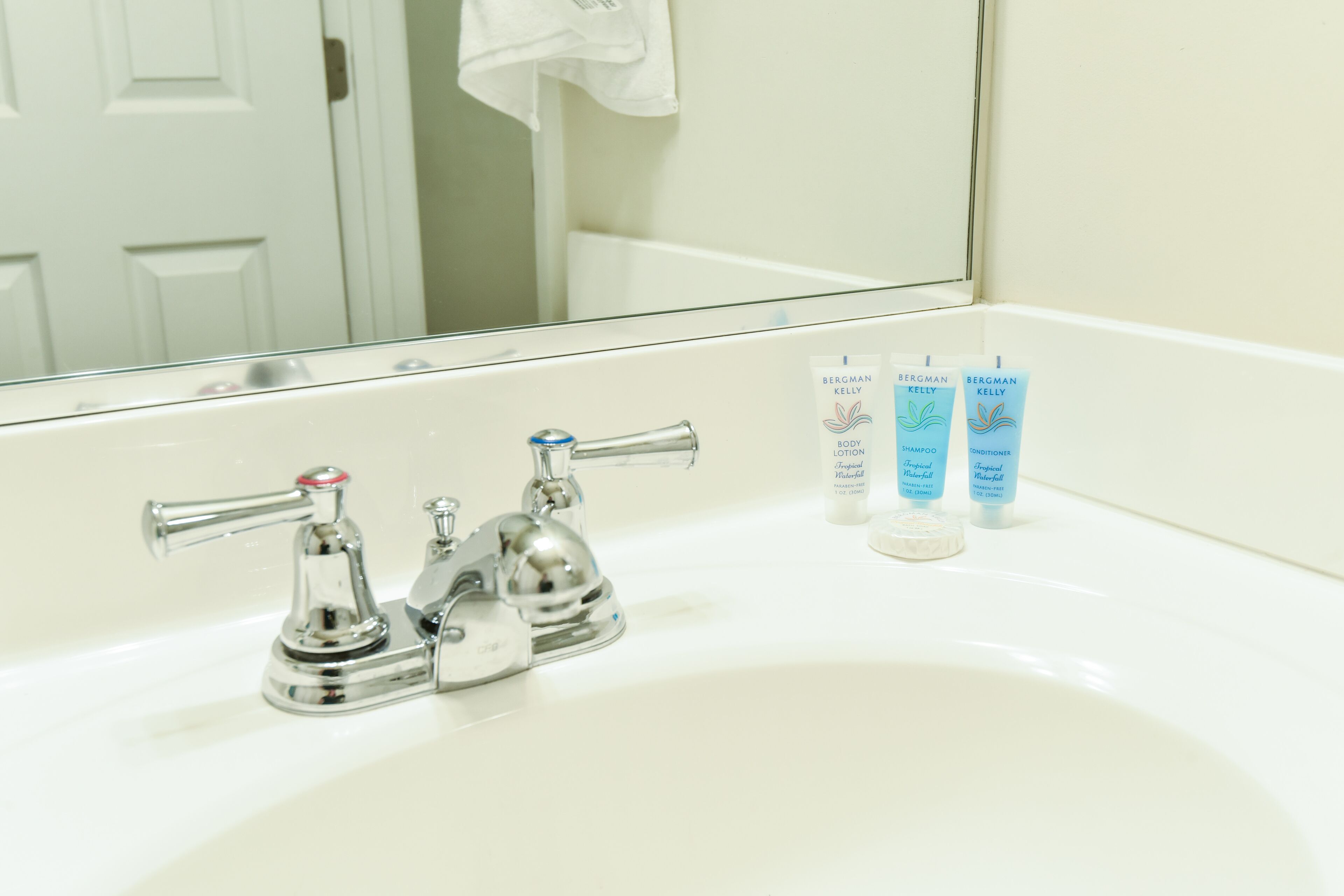 Combined shower/tub, hair dryer, towels, soap