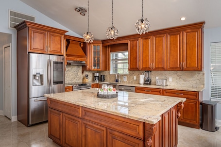 Fridge, microwave, oven, stovetop. Luxury 5 Bedroom Dunedin home ~ TWO full kitchens, heated pool, hot tub!