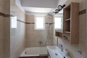 Shower, hair dryer, towels