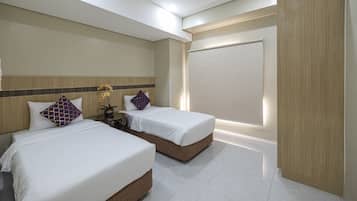Family Room | Hypo-allergenic bedding, down duvets, pillow-top beds, in-room safe