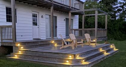 Spacious waterfront home with dock and sunset view