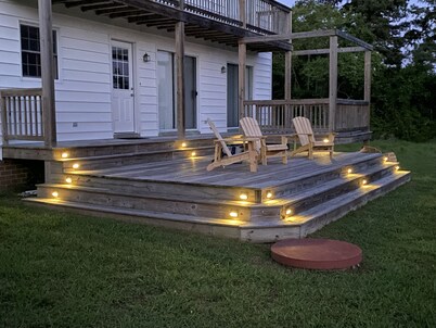 Spacious waterfront home with dock and sunset view