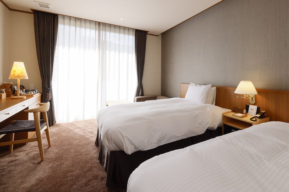Couette en duvet d'oie, coffres-forts dans les chambres, bureau