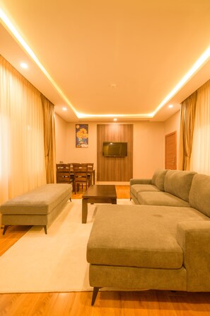 Executive Room, 1 King Bed | Living area | 43-inch Smart TV with satellite channels, TV - Abai Lodges and Spa (Kagio)
