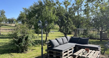 Renovated Farmhouse with Private Pond, Garden, and Garage - Ideal for Fishing and Nature Lovers
