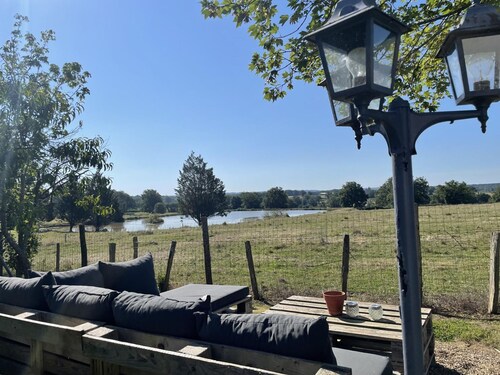 Renovated farmhouse with private pond, pets allowed