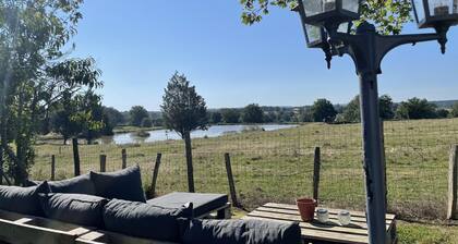 Renovated farmhouse with private pond, pets allowed