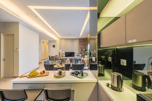 Deluxe Penthouse | Living area | 60-inch Smart TV with digital channels - Ramada Suite Penthouse Bukit Bintang KL (Kuala Lumpur)