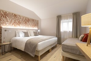 Premium bedding, pillowtop beds, in-room safe, blackout drapes