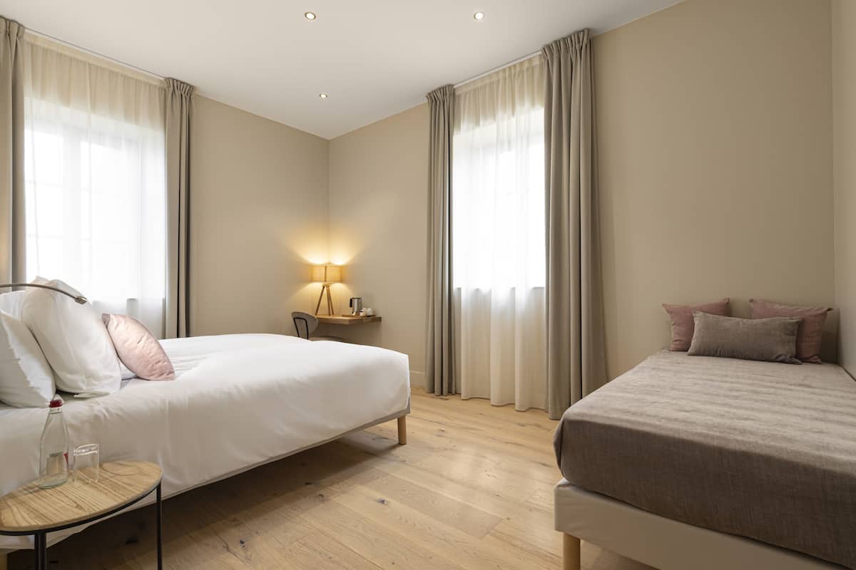 Premium bedding, pillow-top beds, in-room safe, blackout curtains