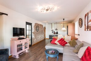 Televisio, DVD-soitin, kirjoja